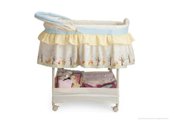 Delta Children Disney Nutopia Gliding Bassinet, Full Side View with Canopy Option a2a