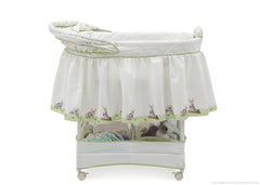 Delta Children Peter Rabbit Gliding Bassinet, Full Right Side View with Canopy Option a2a