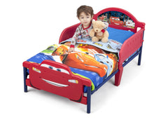 Delta Children Cars Toddler Bed with 3D Footboard Right Side View with Props a1a
