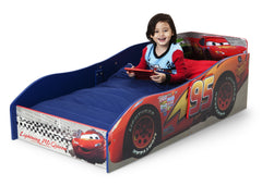 Delta Children Cars Wood Toddler Bed Left Side View with Props a1a